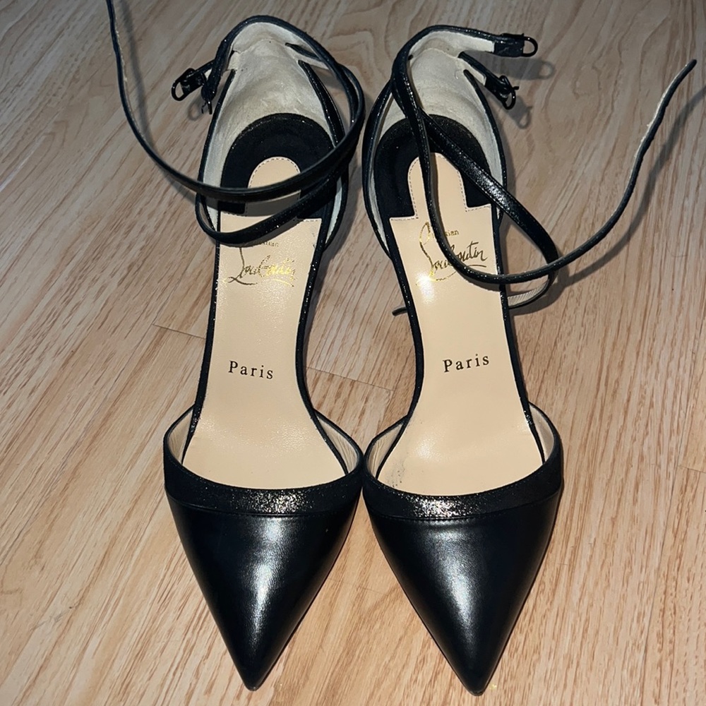 christian louboutin uptown double pumps in black.